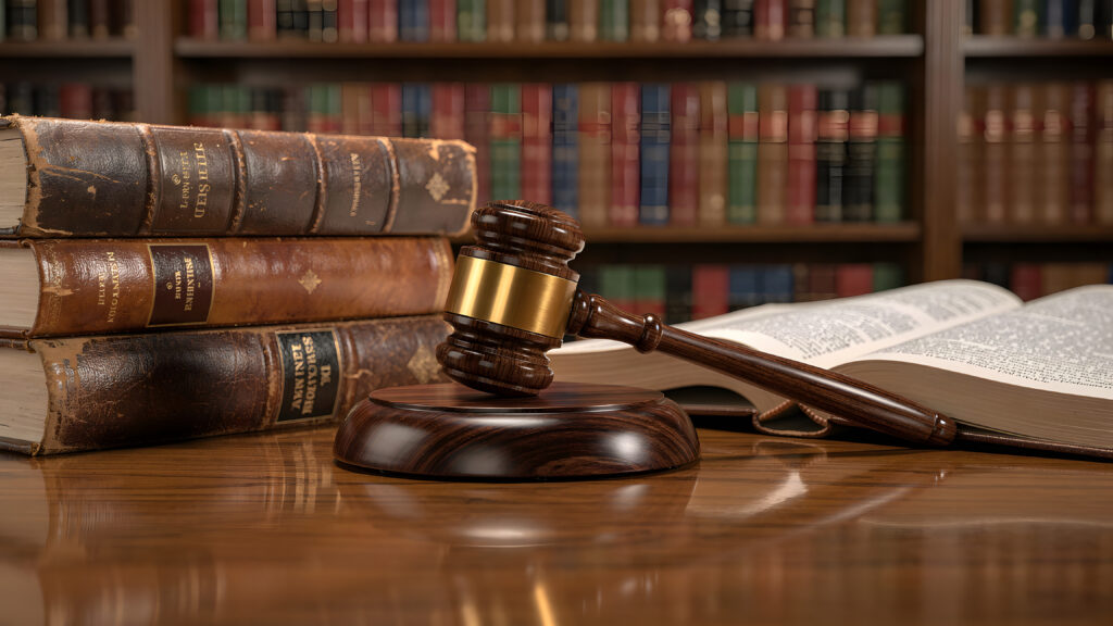 Law Books and Judge Gavel in Library